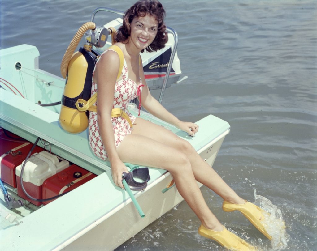 1960s vintage photo of Carol Clough preparing to go scuba diving in Clearwater.