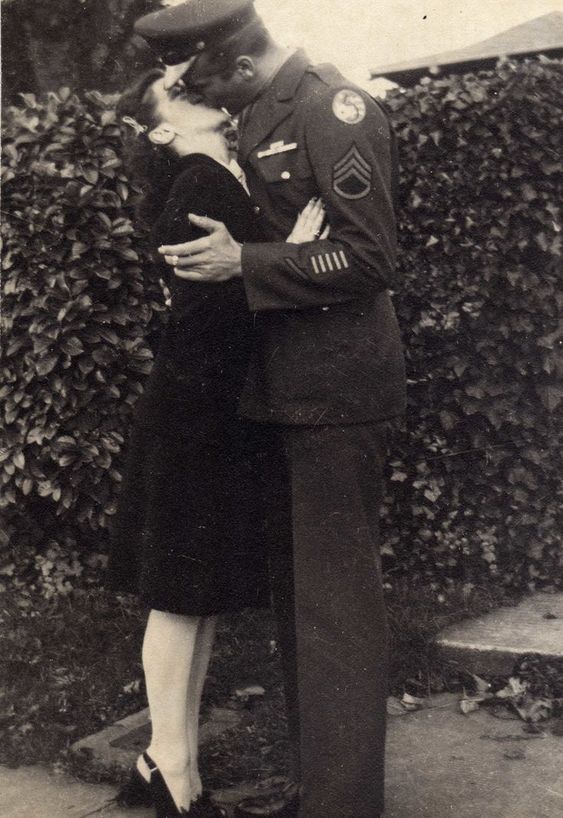 Welcome Home-1940s Photo of a Soldier & His love exchanging a kiss