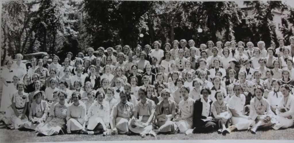 1930s vintage photo: Delta Delta Delta Sorority National Convention (June 28 - July 2 - 1936) yard long photograph. The photo is taken in front of the Broadmoor Hotel in Colorado Springs. 1930s photo showcases 1930s fashions and 1930s hairstyles. 