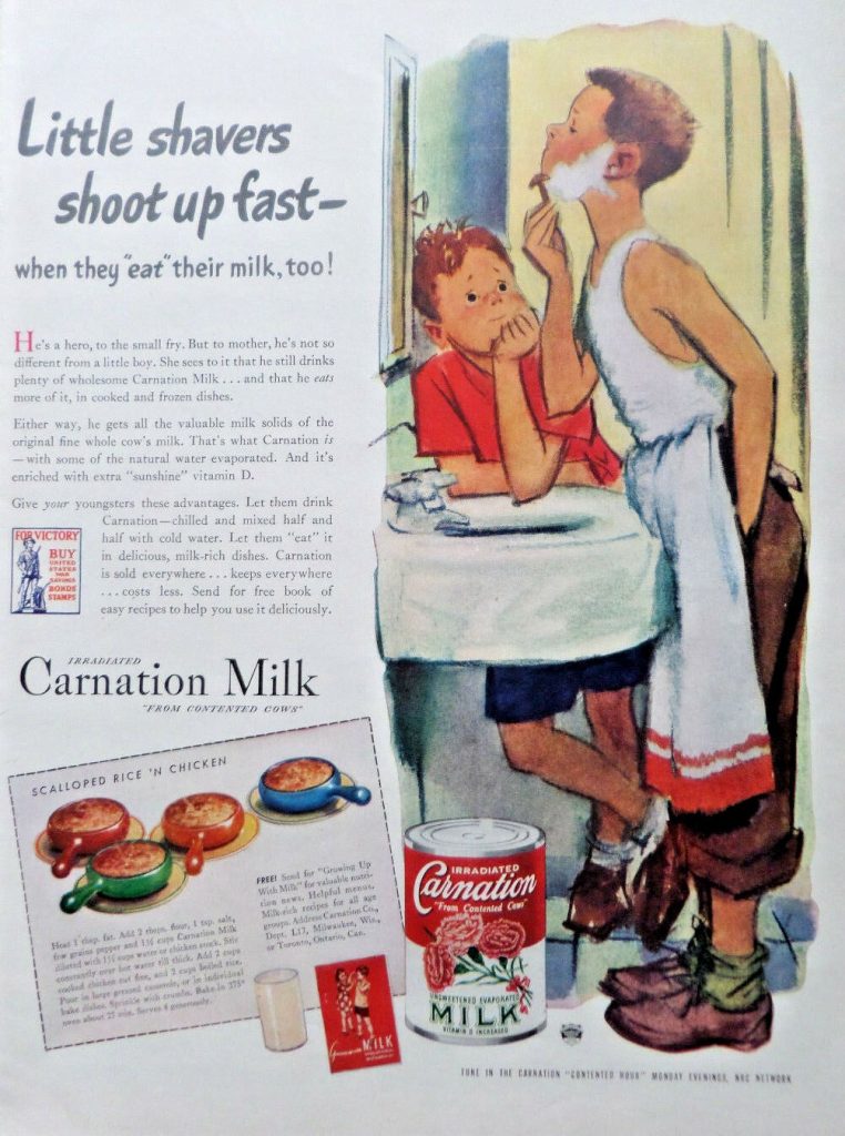 1940s vintage ad for Carnation Milk featuring an illustration of two young men one is shaving and a 1940s recipe for scalloped rice and chicken