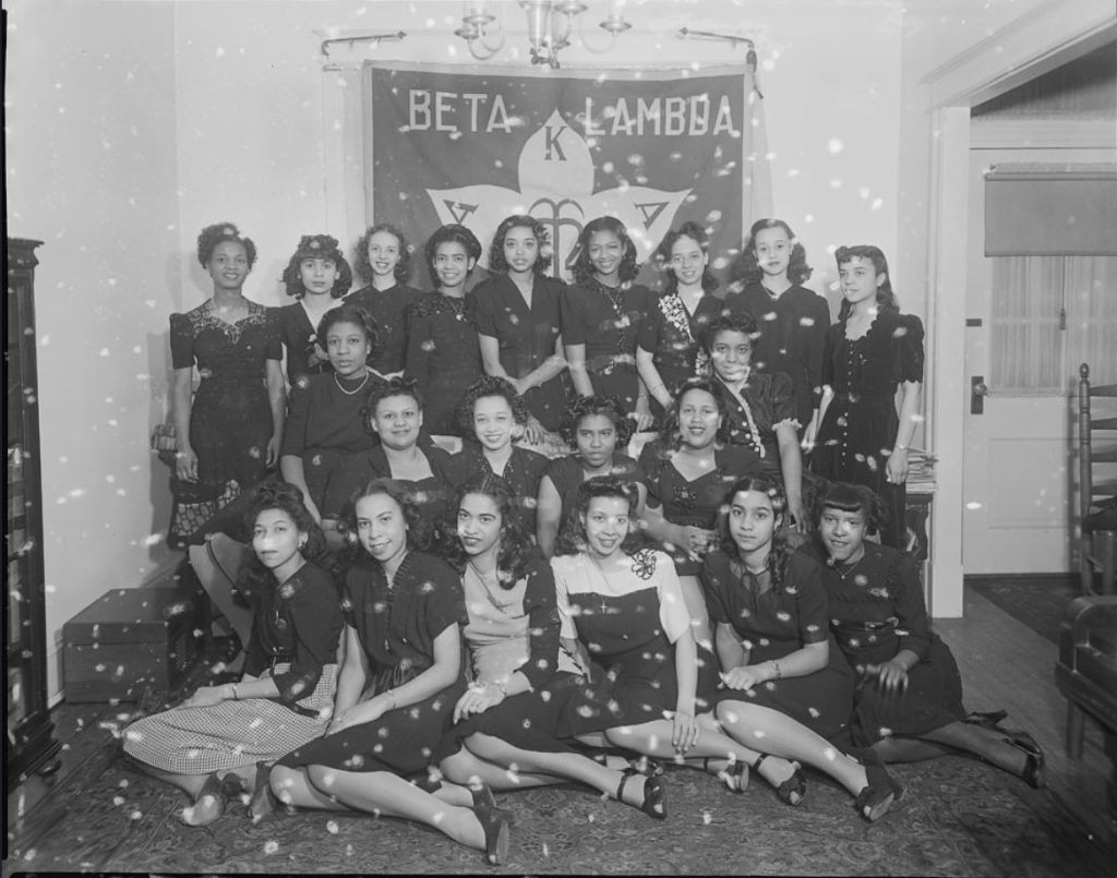 1940s vintage photo of Black Women college students at Howard University in their Sorority photos and in 1940s fashions and 1940s hairstyles