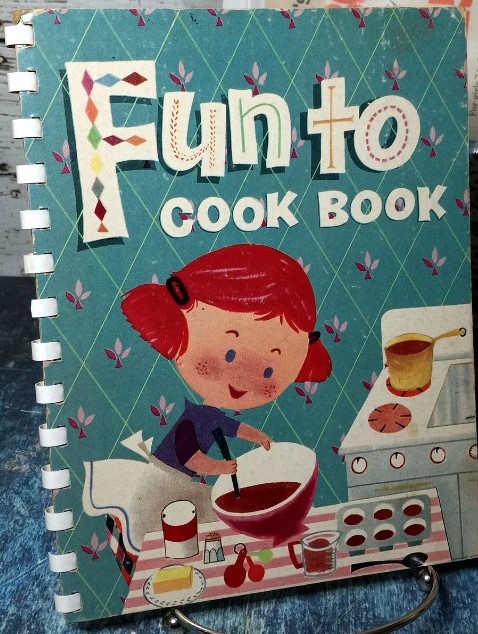  A 1955 Carnation brand children's cookbook called 'Fun to Cook'. "For girls 7to 14. 48 pages of fun-full recipes in a child's own language!