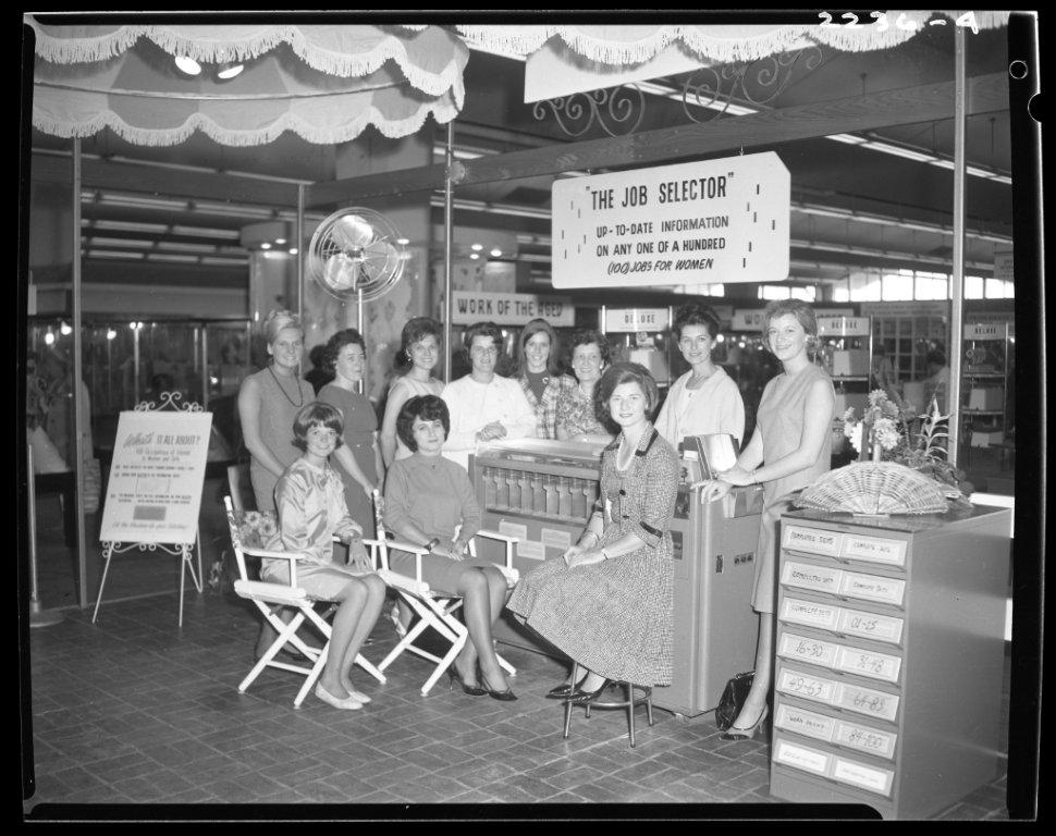 1960s vintage photo of women in 1960s fashions at the 100 Jobs For Women Display @ The CNE ca. 1960s