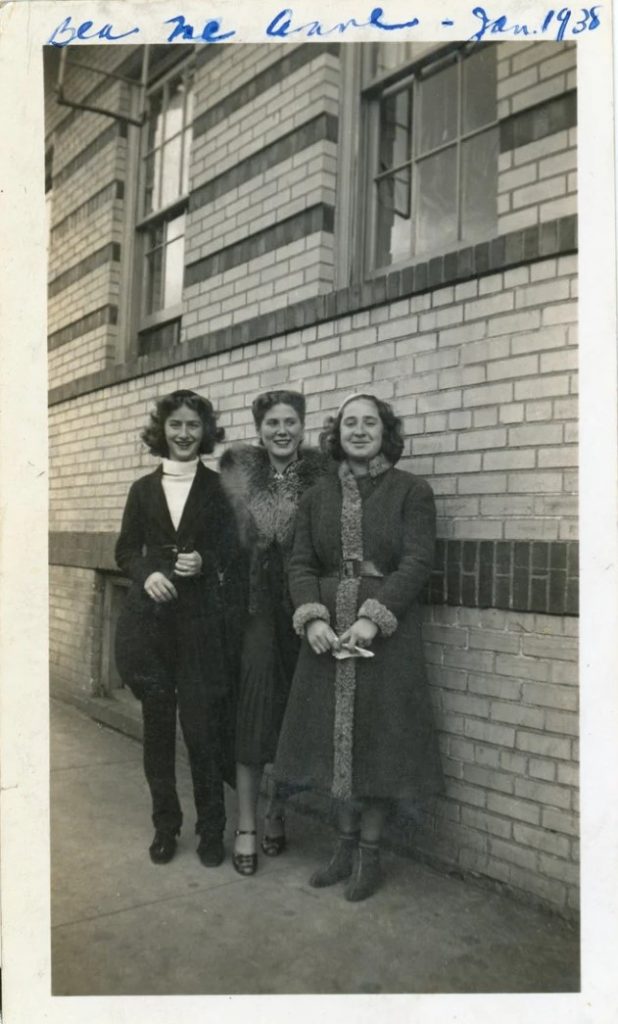 1930s vintage photo of three young women in 1930s coats one being a fur coat posing together. Great 1930s fashions