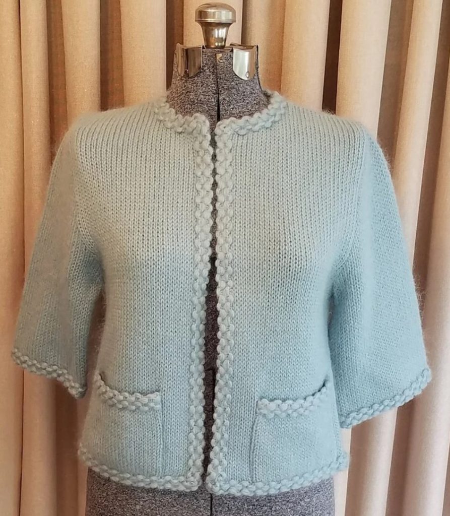 1960s Fashion: Blue mohair cardigan from Ethel of Beverly Hills. 