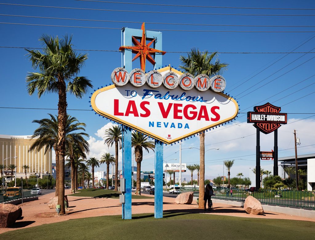 Mid Century Vintage neon sign: The Welcome to Las Vegas Sign. Featuring a Starburst design at the top.