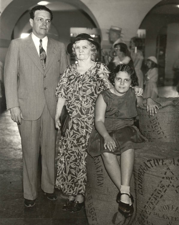 1930s vintage photo of three generations of Cubans during a neighborly visit to the Puerto Rican exhibit at the chicago World's Fair 1933 1934