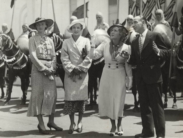 1930s vintage photo of Mary Pickford at the Chicago's World's Fair in 1934. The women in the photo are wearing stunning 1930s fashions. 