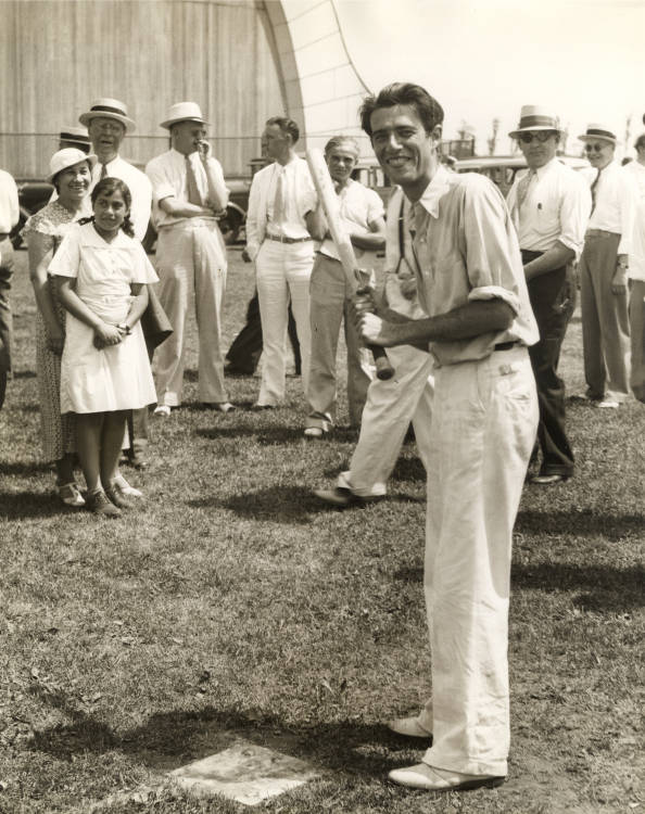 1930s vintage photo of Dan Seidenberg, first cellist, up to bat in a softball game between the Chicago and Detroit Symphony Orchestras