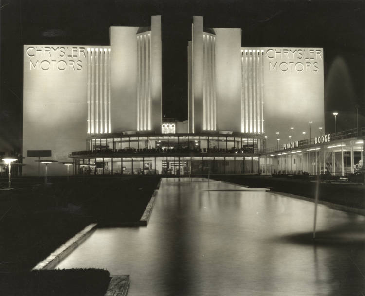 1930s vintage photo of the Chrysler Motors building at night at the 1933 Chicago Worlds fair