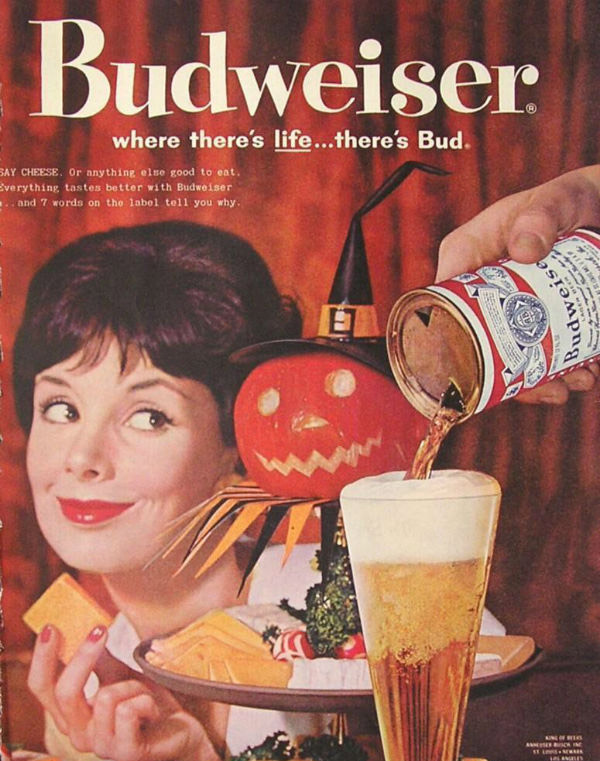 1960s ad for Budweiser and cheese and an odd Halloween decoration of a cheese tray and a pumpkin. 