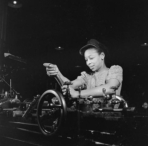 1940s Vintage Photo of Cecilia Butler a Black Women working in the John Inglis Company munitions plant in Toronto during the Second World War, December 1943.