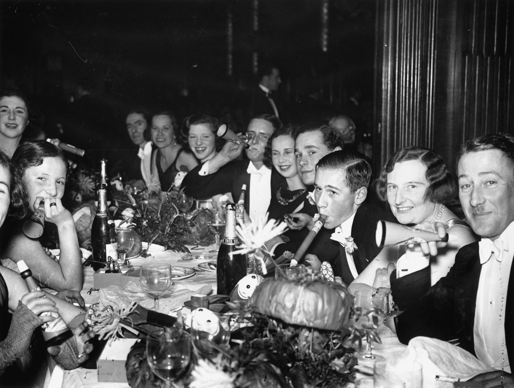 1930s vintage photo of a 1930s New Years Eve Party. A New Year's Eve celebration at London's Piccadilly Hotel on Dec. 31, 1931.