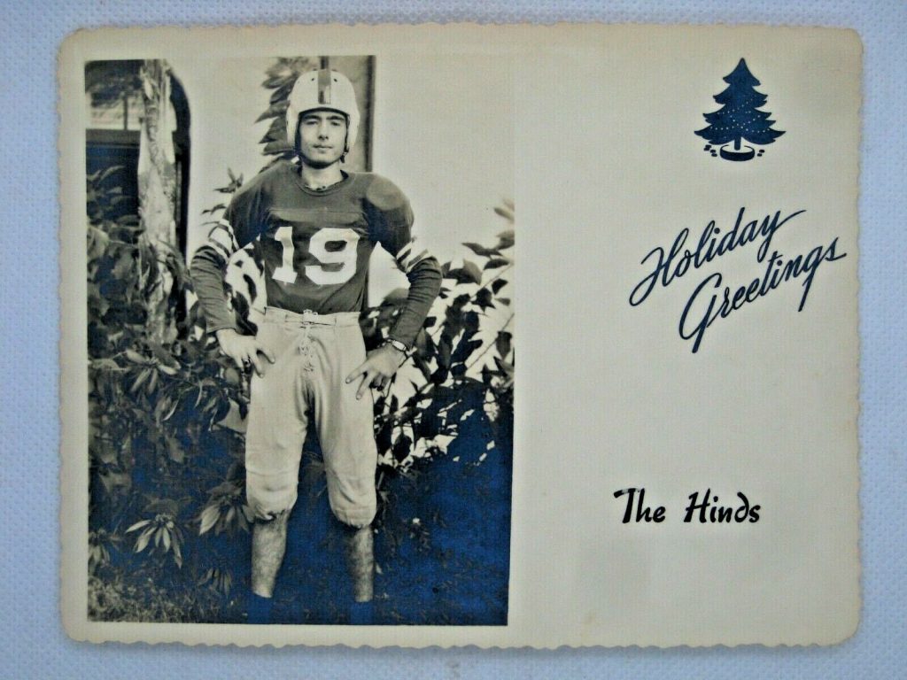 1940s/ 1950s Vintage Christmas Photo Card featuring an image of a young man in football uniform. 