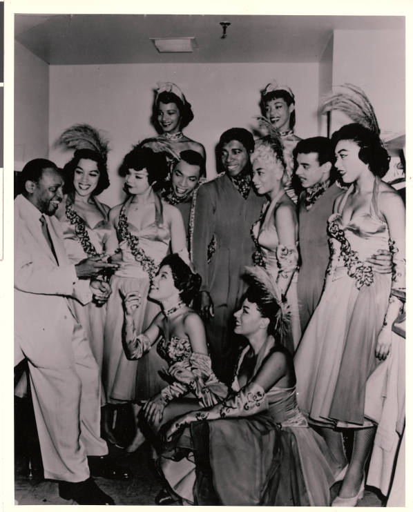 1950s vintage Photograph of Lionel Hampton with members of the Moulin Rouge show group, 1955