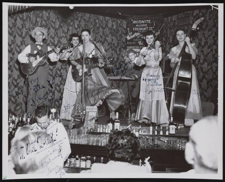 1950s Vintage Photo: Group of entertainers called "Polly Possum, Joe Wolverton and the Dogpatch County Band" performing at the Golden Nugget Saloon in downtown Las Vegas. Fun Vintage Las Vegas image.