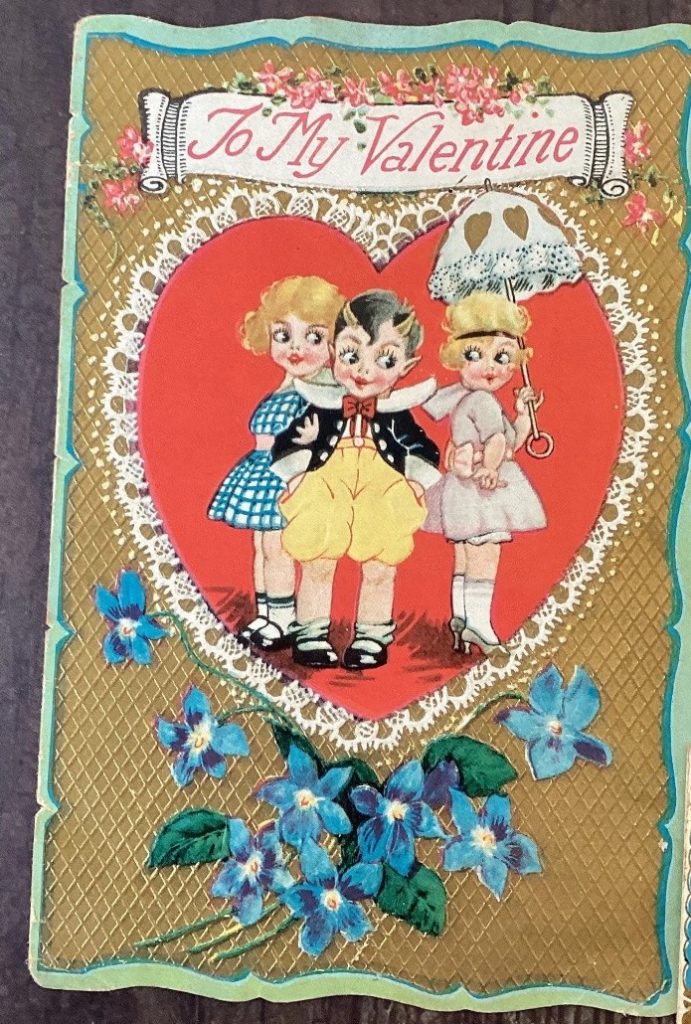 1930s vintage Valentine Card featuring an illustration of 3 little kids "To My Valentine". 