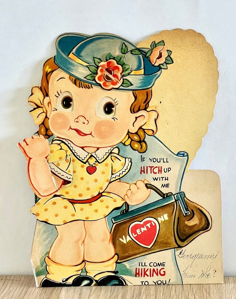 1940s Valentines Day Card / 1940s featuring a girl with luggage looking to travel with the one she loves. Happy Valentine's Day!