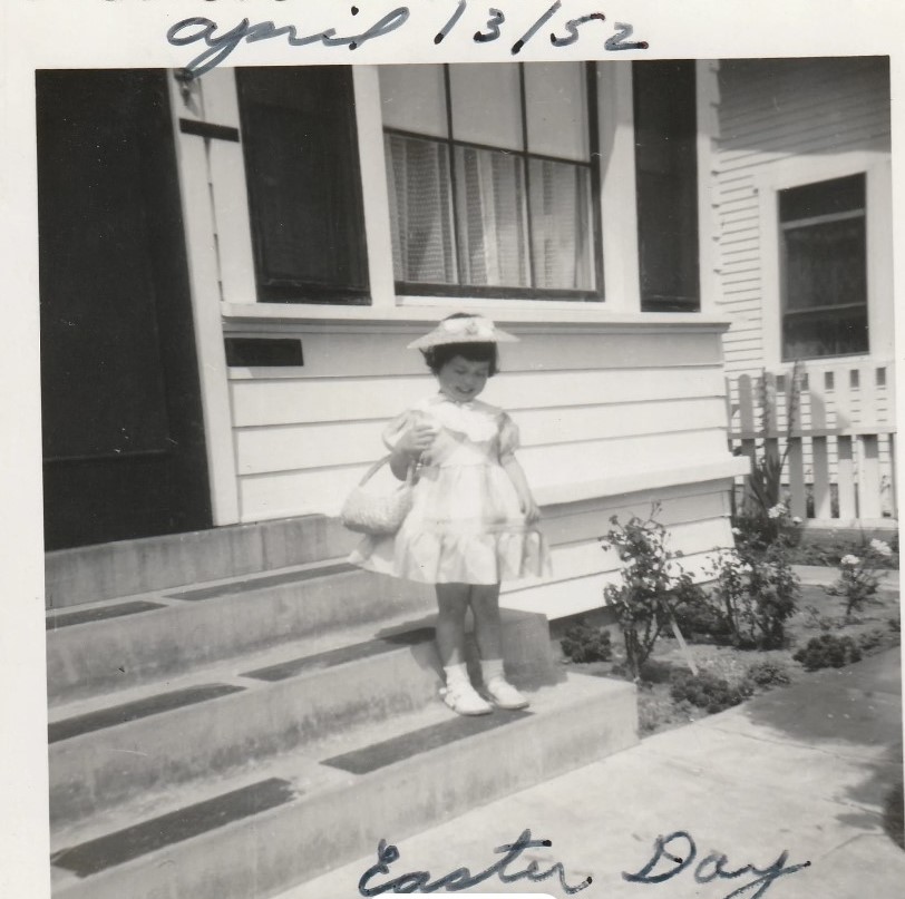 1950s vintage photo: April 13th, 1952. Easter Sunday! Cute little girl with a big smile ready to Egg Hunt in her Easter Sunday best (adorable dress & hat!)