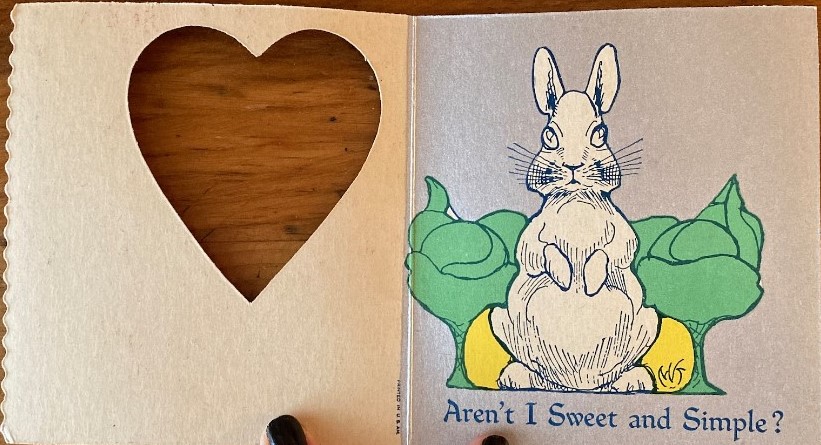 Vintage Valentines Day Card from the 1930s or 1940s featuring a rabbit on the front and inside