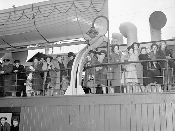 1940s vintage photo of War brides and their children en route to Canada. Photo taken in England, 17 April 1944.