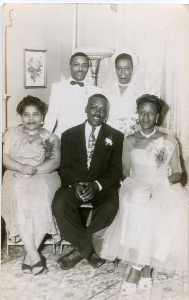 Late 1940s early 1950s Vintage Wedding Photo of a Black Bridge & Groom and their Black parents in their wedding outfits. Stunning! 