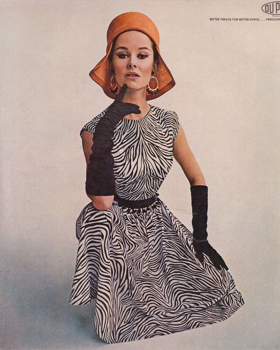 1960s vintage fashion ad L'Aiglon for DuPont 1963 featuring a woman in a zebra print 1960s dress