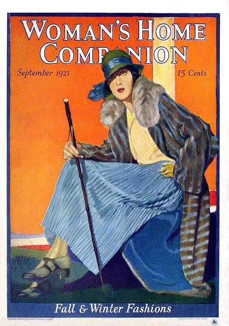 1920s Vintage Magazine Cover from 'Woman's Home Companion', September 1923 featuring an illustration of a woman in 1920s Fall & Winter Fashions. 