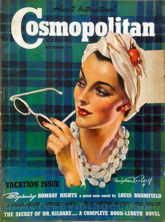 1930s Vintage Magazine Cover for Cosmopolitan Mangazine September 1939 featuring a woman with a stylish Hair Turban, 1930s round sunglasses and statement piece necklace on a plaid background. 