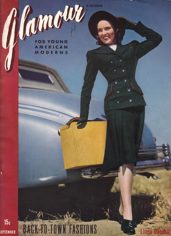 1940s vintage magazine cover for GLAMOUR from September featuring a stylish woman (Linda Darnell) in 1940s fashions posing with a car.