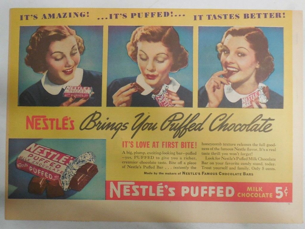 1930s vintage ad for Nestle's Puffed Milk Chocolate bar featuring a woman with a 1930s hairstyle enjoying the chocolate bar. 