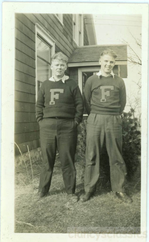 1940s vintage photo of twin young men wearing letterman sweaters from fort frances high school