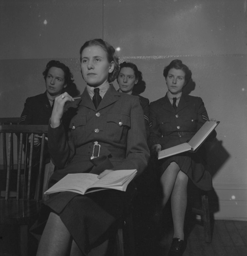 1940s vintage photo of the Canadian Woman's Army  during WW2- Unidentified Women in Uniform Sitting With Book on Laps