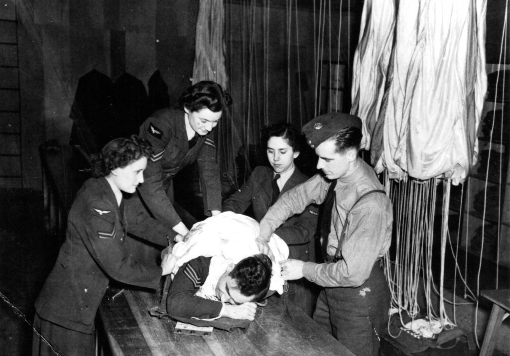 1940s Vintage Photo: In the Canadian Auxiliary Air Force, women worked in the parachute packing and checking department.