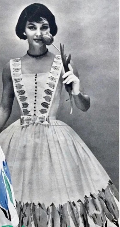 1950s Fashion: 1950s Vicky Vaughn Tulips dress as seen in a 1950s vintage advertisement.