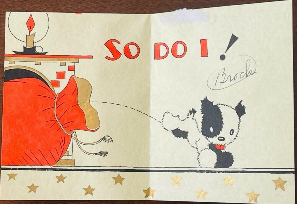 1930s vintage Christmas Card inside featuring santas toy bag and a cute dog illustration jumping out. 