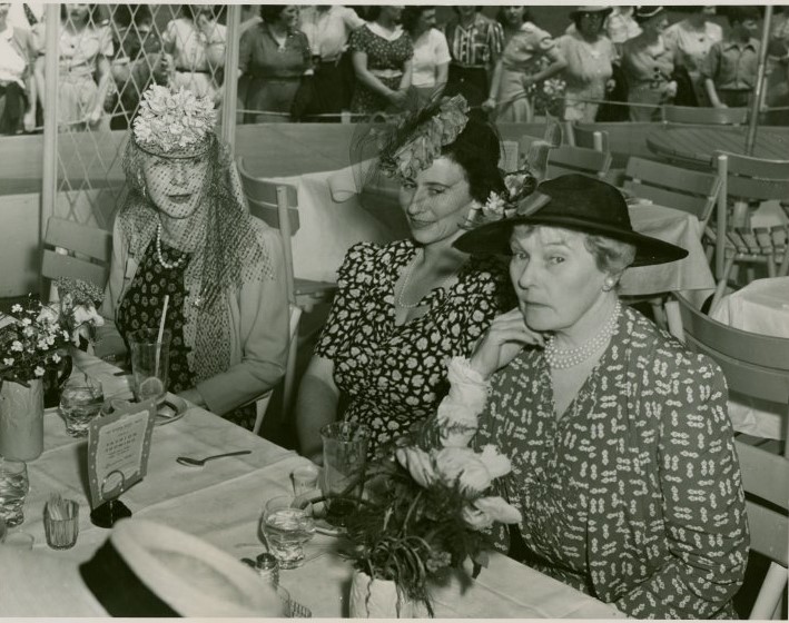 1930s vintage photo: National Advisory Committees - Women's Participation - At luncheon in Hall of Fashion at the 1939 New York City Worlds Fair. Fantastic late 1930s hats and patterns on these stylish womens dresses. 