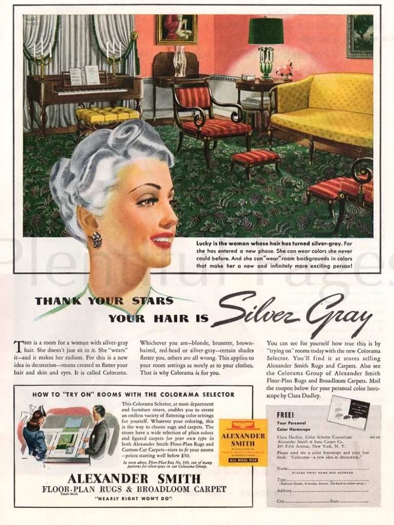 1940s Vintage Flooring Ad from 1941 for Alexander Smith Rugs featuring a woman with silver gray hair 1940s hairstyle posing in front of her livingroom with green carpet and yellow furniture. 