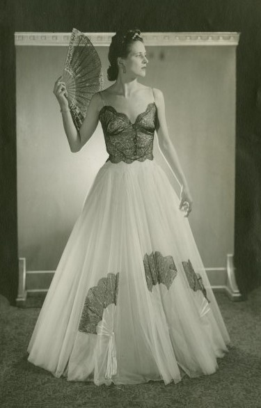 1940s vintage photo of a model in a 1940 evening gown at the World of Fashion exhibit at the New York City's Worlds Fair 1940. Fantastic early 1940s fashion inspiration.