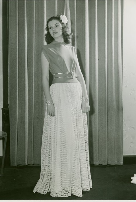 Germanine Monteil original evening gown-1940s vintage photo of a model in a 1940 evening gown at the World of Fashion exhibit at the New York City's Worlds Fair 1940. Fantastic early 1940s fashion inspiration.