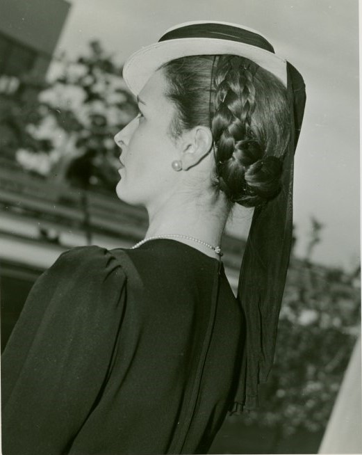 1940s vintage photo of an early 1940 late 1930s vintage hairstyle featuring a Hair crown with a hat as seen at the 1940 New York World's Fair 'World of Fashion' Exhibit. Fantastic vintage hairstyle inspiration.