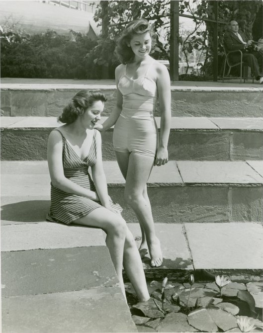 1940s vintage photo of a 2 women modeling early 1940s swimsuit at the World of Fashion exhibit at the New York City Worlds Fair 1940