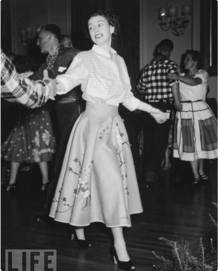 1950s vintage photo of Queen Elizabeth in a Juli Lynn Charlot 1950s Felt Skirt with appliques at a square dance in the 50s