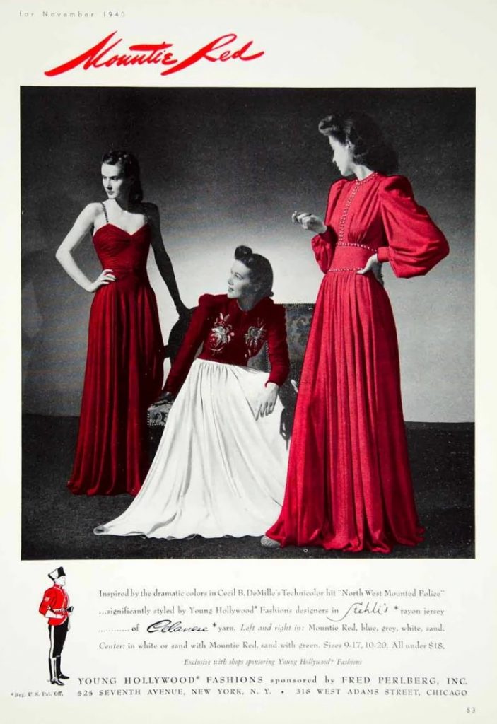 1940s vintage advertisement / 1940s Fashions: 1940s evening gowns inspired by the dramatic colors in Cecil B. DeMille, "North West Mounted Police" with Gary Cooper & Paulette Goddard. Dresses by Fashion Designer-Fred Perlberg