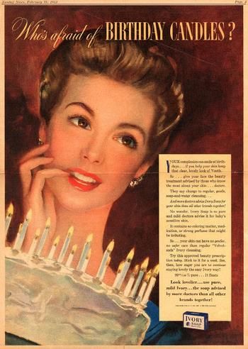 "Who's afraid of BIRTHDAY CANDLES?" 1940s vintage advertisement for IVORY SOAP. The vintage ad features a woman posing in front of her birthday cake and a 1940s hairstyle. 