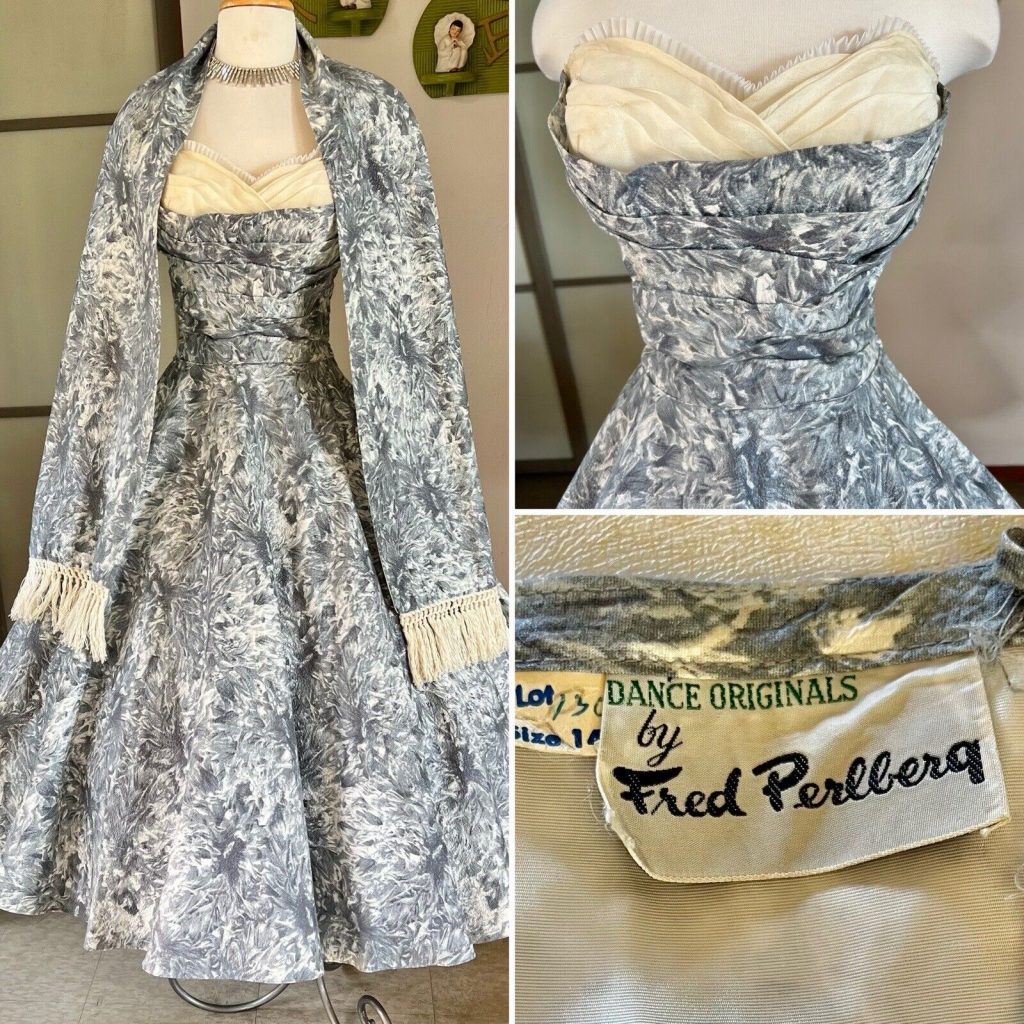 1950s Fashion: A 1950s Fred Perlberg Dance Originals party dress with matching shawl. Fred Perlberg was well known for his party dresses and this is a beautiful example. The fabric is textured and embossed. It is a strapless style with a heavily boned bodice and a nipped waist. The waist is pleated and the bodice is sheer ivory fabric with a lace trim. There is a built in crinoline to give the dress structure but I have also shown it with an extra crinoline. The dress has a metal side zipper with a hook and eye. The shawl has tasseled ends.