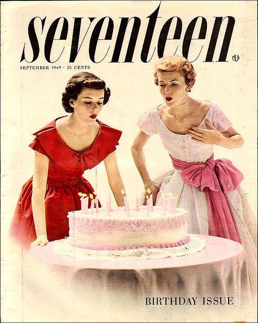 1950s vintage magazine cover Seventeen magazine from September 1949 featuring two young women in late 1940's dresses blowing out birthday cake candles