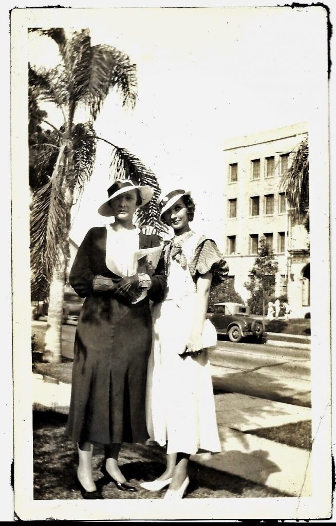 1930s vintage photo of two stylish women in 1930s dresses and 1930s hats. A vintage photo of a mother and her daughter. Fantastic 1930s fashion inspiration.