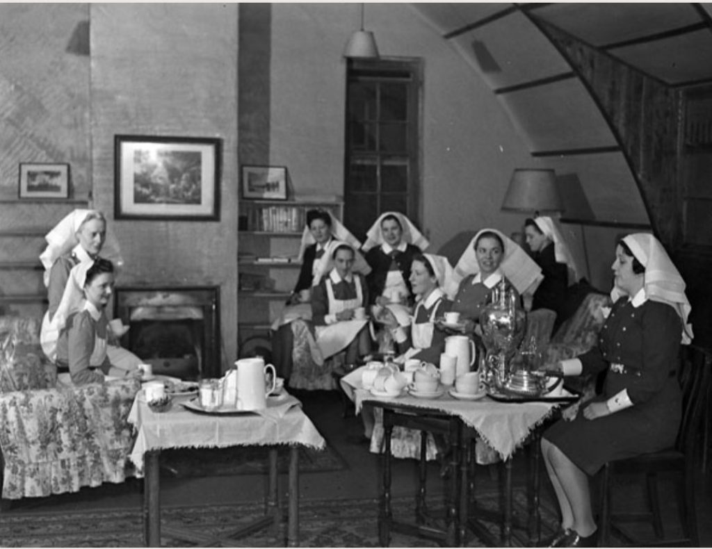 1940s vintage photo: Canadian Nursing sisters having tea, No.8 Canadian General Hospital, Royal Canadian Army Medical Corps (R.C.A.M.C.), Aldershot, Hampshire, England, 24 November 1943