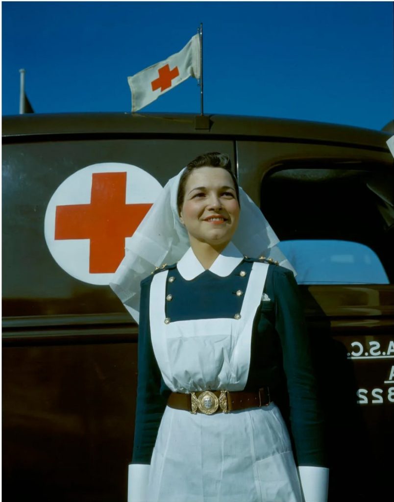 1940s Vintage Photo of a Canadian Nursing Sister in uniform in front of an Ambulance during WW2